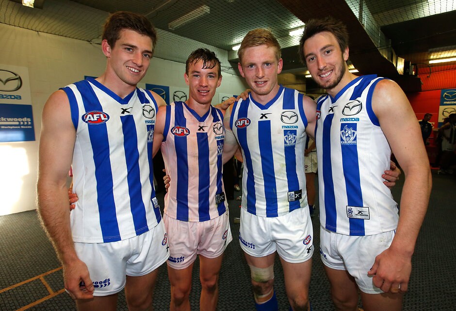 AFL 2014 Rd 20 - GWS Giants v North Melbourne (L-R) Former Murray Bushrangers players Shaun Atley, Kayne Turner, Jack Ziebell and Sam Wright of the Kangaroos pose for a photograph during the 2014 AFL Round 20 match between the GWS Giants and the North Melbourne Kangaroos at StarTrack Oval, Canberra on August 09, 2014. (Photo: Michael Willson/AFL Media)